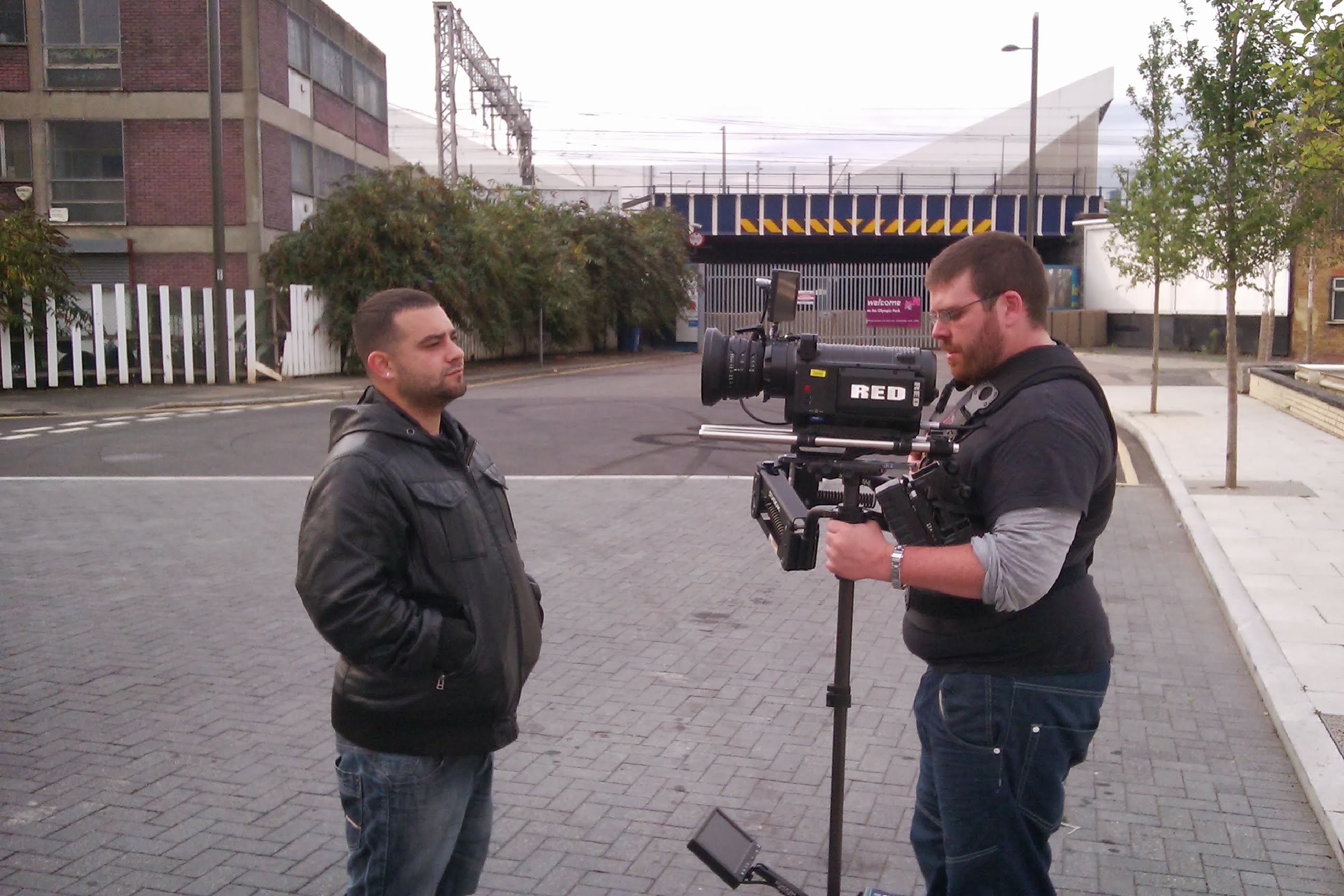 Darragh Alder, founder of 7th Avenue Media, filming on location with a RED cinema camera on a steadicam